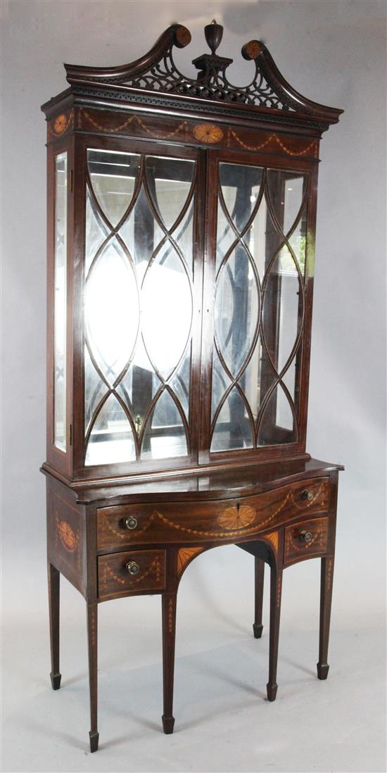 An Edwardian Sheraton Revival marquetry inlaid mahogany bookcase, W.3ft 3in. D.1ft 6in. H.7ft 4in.